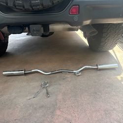 OLYMPIC CURL BAR WEIGHTS ABOUT 25LBS