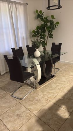 Modern dining table with chairs