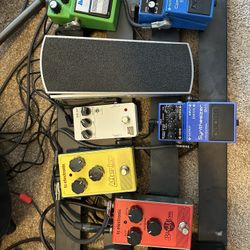 Multiple Guitar Pedals and Board