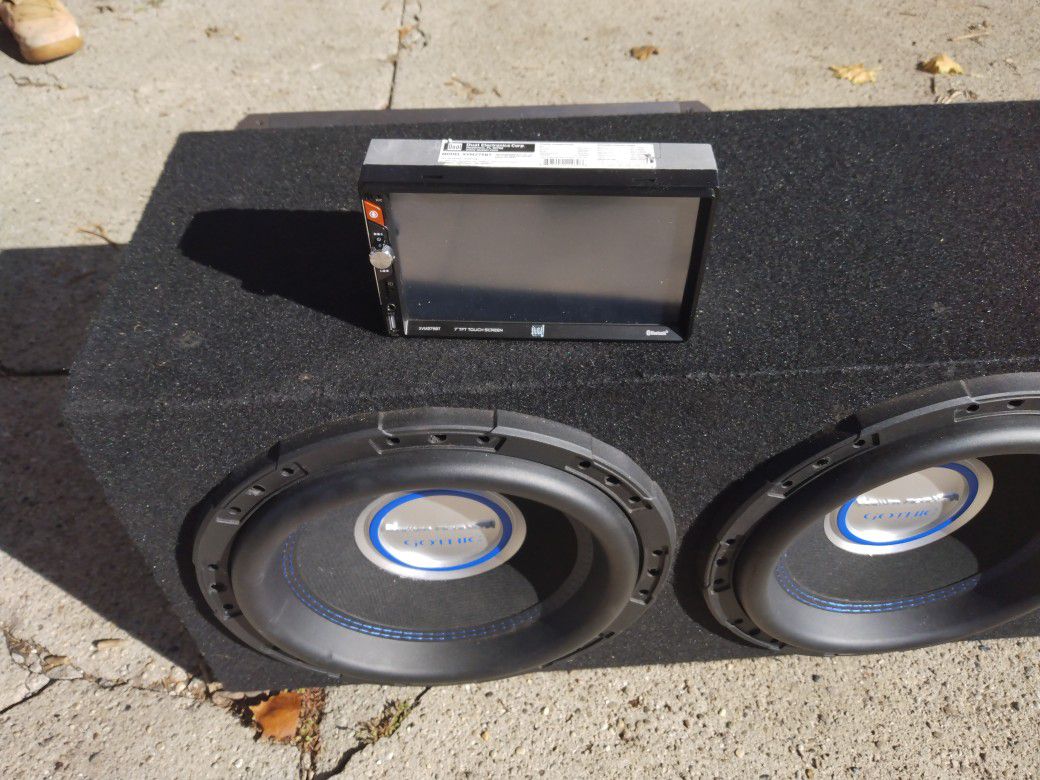 Ten Inch Subs good Condition With A Slab Amp That Nocks Blue Tooth Touch Screen Like new