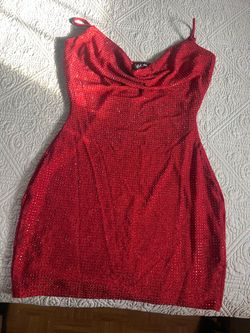 Red mini dress covered in rhinestones