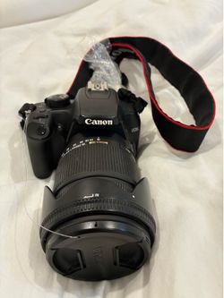 Canon EOS Rebel XS with Sigma 18-250mm lens