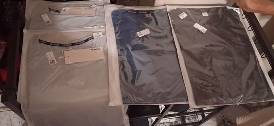 4 Large shirts for one price.