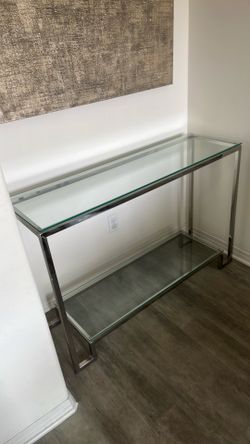 Glass and stainless steel console table