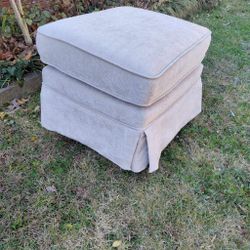 Glider Ottoman In Cream Color.
