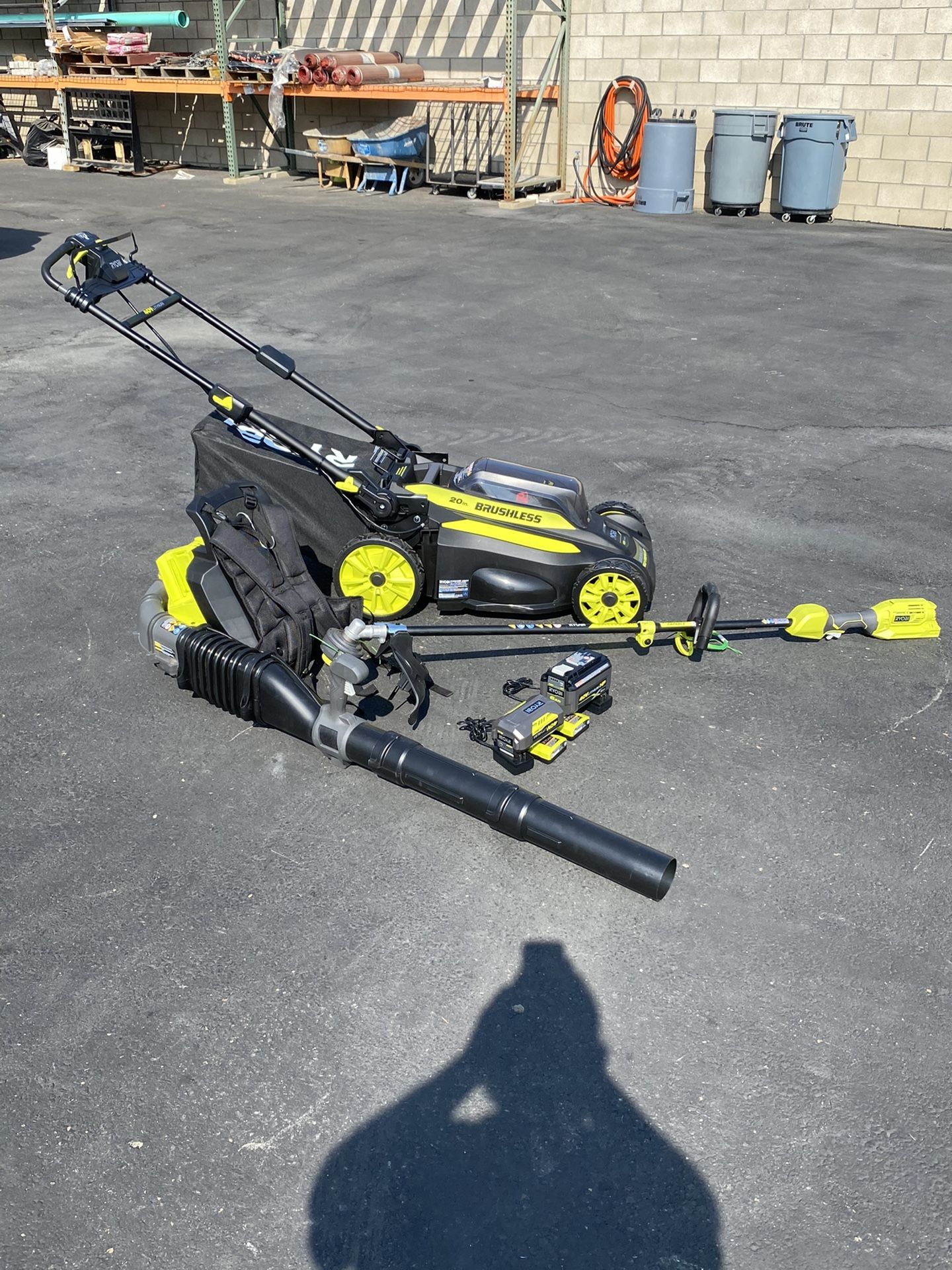 3pc Ryobi 40v Self propelled lawn mower, string trimmer and backpack blower with 2 batteries and 2 chargers