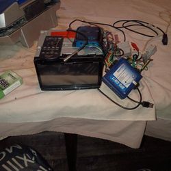 A Pioneer Touch Screen Radio With The Remote With All The Cords And Everything