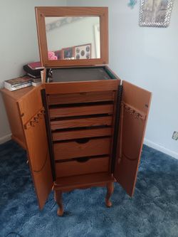 Tall Wooden Jewelry Armoire with Mirror