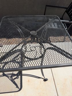 30x30” metal table with two chairs