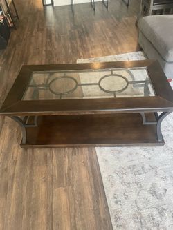 Dark wood & glass coffee table with shelf. Great condition!