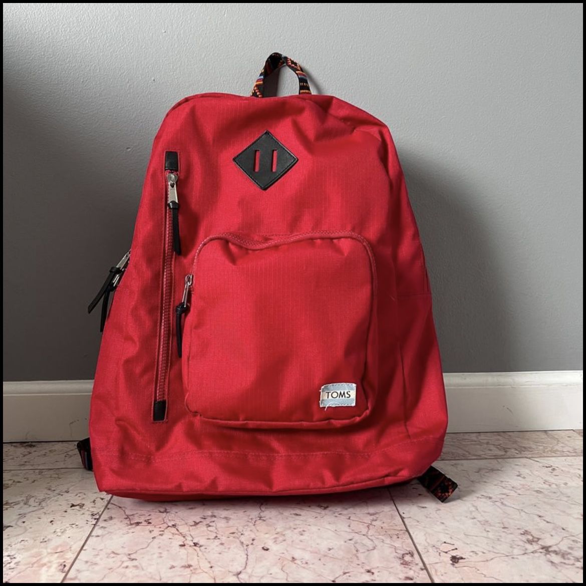 RED TOM'S BACKPACK FOR TRAVELING, WORKING, GYM EQUIPMENT AND MORE!