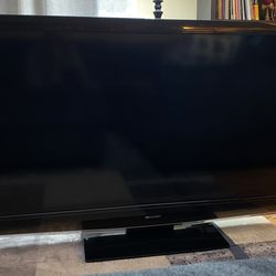 52” Sharp Aquos TV w/wall mount & stand