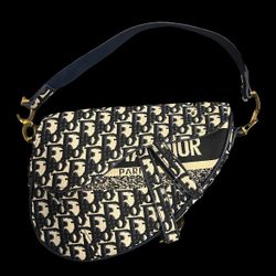 This Christian Dior Blue Oblique Jacquard Saddle Shoulder Bag