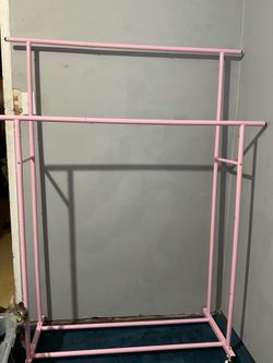 Pink clothing rack