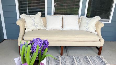 Cream  Sofa with Wooden Legs indoor/ patio room