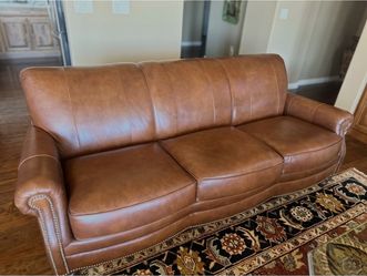 Brown letter, studded sofa, loveseat, and ottoman (2)
