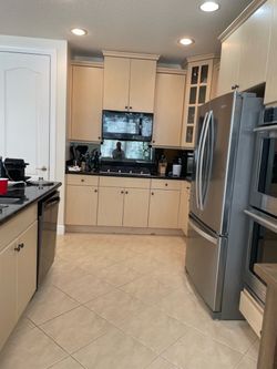 Kitchen Cabinet Set with Hardware with some appliances