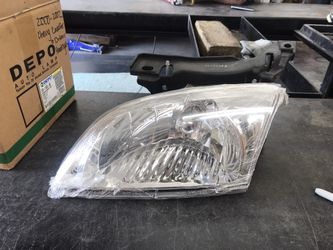 00-02 Chevy Cavalier Left Headlight