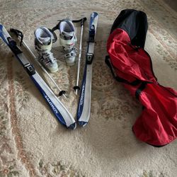 Skis,Poles,boots,  JUST SERVICED.   MAKE  AN OFFER