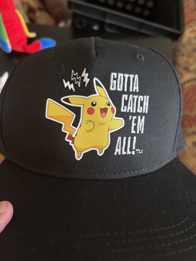 Black and yellow Pikachu cap 2022