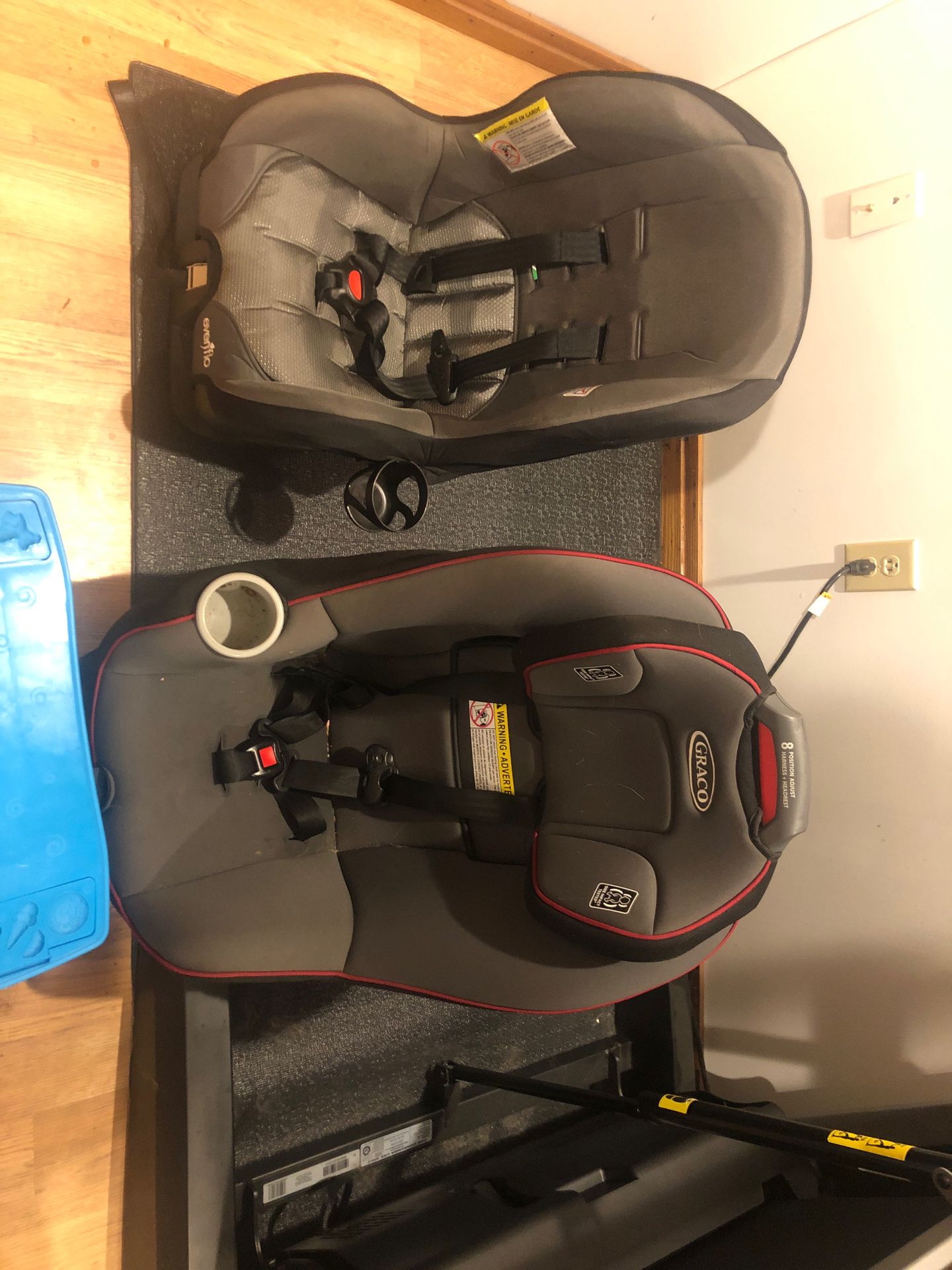Car seats forward facing. Graco on right is sold. Even flo on left available