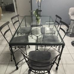 Juego de comedor con mesa de vidrio y 6 silla