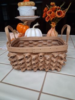 Vintage Handwoven Splitwood Porcupine Curl Basket with Double Rivetted Wooden Handle. Wonderfully Crafted....asking $25.00