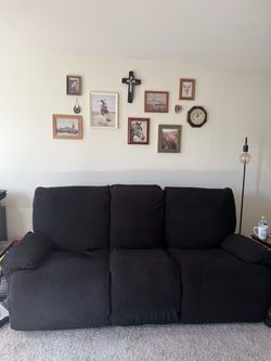Leather couch with Black cover