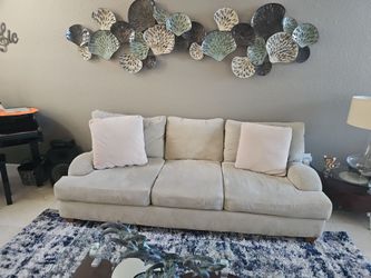 Juego de sala con mesa de centro de madera y cristal