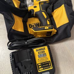 Used DeWalt DCF787 20V MAX Brushless Impact Driver for sale along with New Charger + New DeWalt Tool Bag 