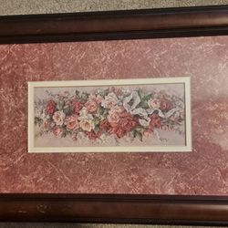 This ready to hang, art piece features dark and light pink flowers filling the frame