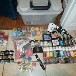 a bunch of Tim Holtz Distress package with lots of stamps 