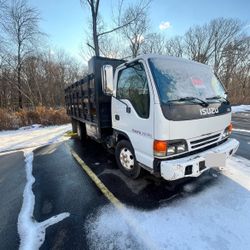2002 Isuzu NPR Flatbed With Rails