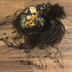 Decorative Green Hat With Black  Dotes on it 