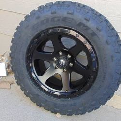 275 70 18 Kelly Edge M/T Tires and 18X9 Matte Black Gloss with Lip Fuel Ripper Rims 6X135