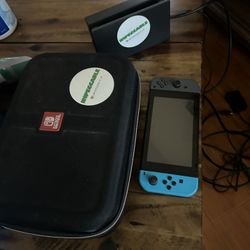 Nintendo Switch + Controllers and Console Carrying Case