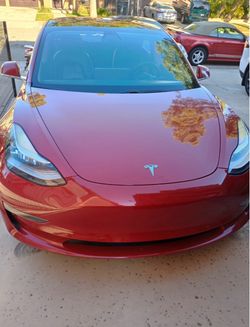 Tesla Model 3 Red Electric Sedan