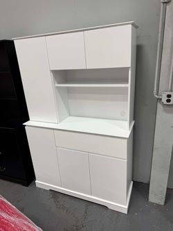 New in box 71" Tall  white kitchen storage cabinet with 6 doors and 1 drawer. Freestanding storage unit with countertop shelves, suitable for dining r