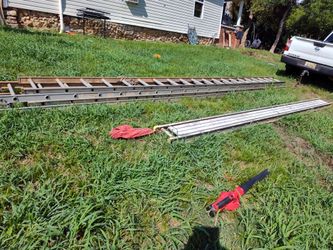 2 Werner 40ft aluminum ladders and plank