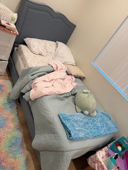 Twin bed with mattress and box spring