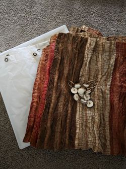 Shower curtain liner and hooks. Used only once.. was in guest room