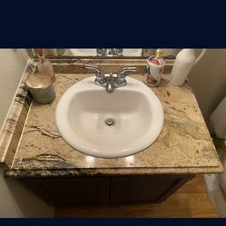 32” Slab With Sink In Middle And Back Splashes