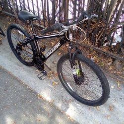 Boys 24" mongoose mountain bike with front disc brake