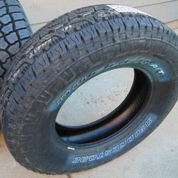 4 New 265 70 18 Bridgestone Dueler A/T Revo3 Tires Outlined White Letters 4PLY Date 2023