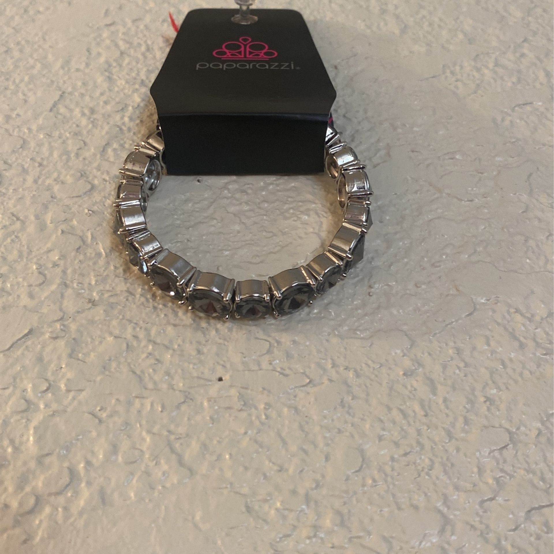 Stretch band bracelet absolutely adorable with gray rhinestones