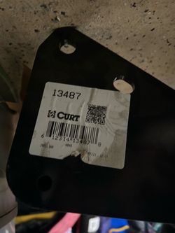 The CURT 13487 is a Class 3 trailer hitch with a 2-inch receiver tube, specifically engineered
