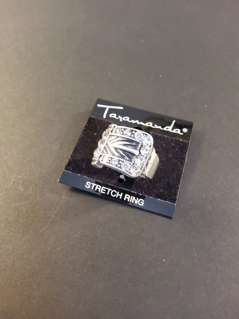 A Man's Ring That fits most Gold Plated And Silver Plated . Size Fits most most .