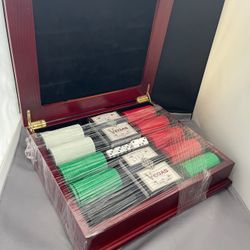 Vegas brand playing cards and poker chips and wood case.