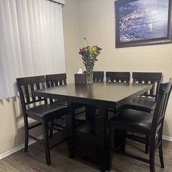 Extended dining table (higher ) and 6 chairs