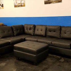Neww Heights Black Faux Leather Reversible Sectional with Storage Ottoman / couch